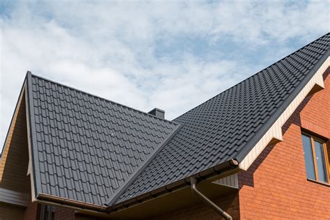 metal roof on t shaped house|triangular roof shapes.